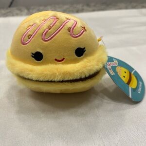 Squishmallows Yellow Macaron Plush with Pink Swirls